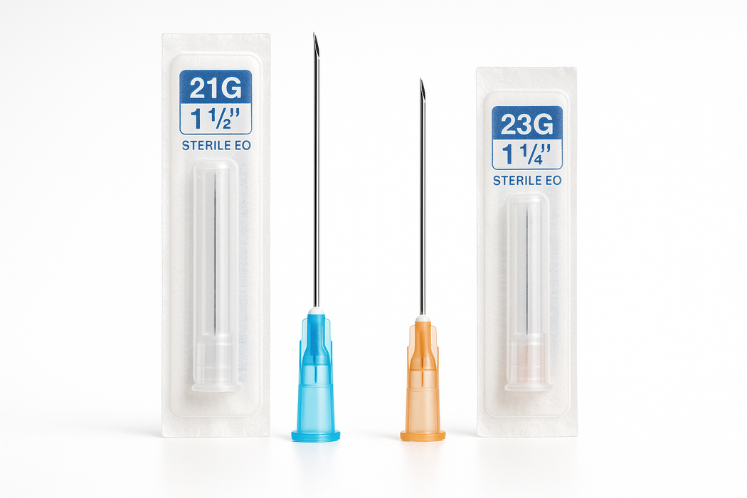 Two sterile needles with packaging on a white background